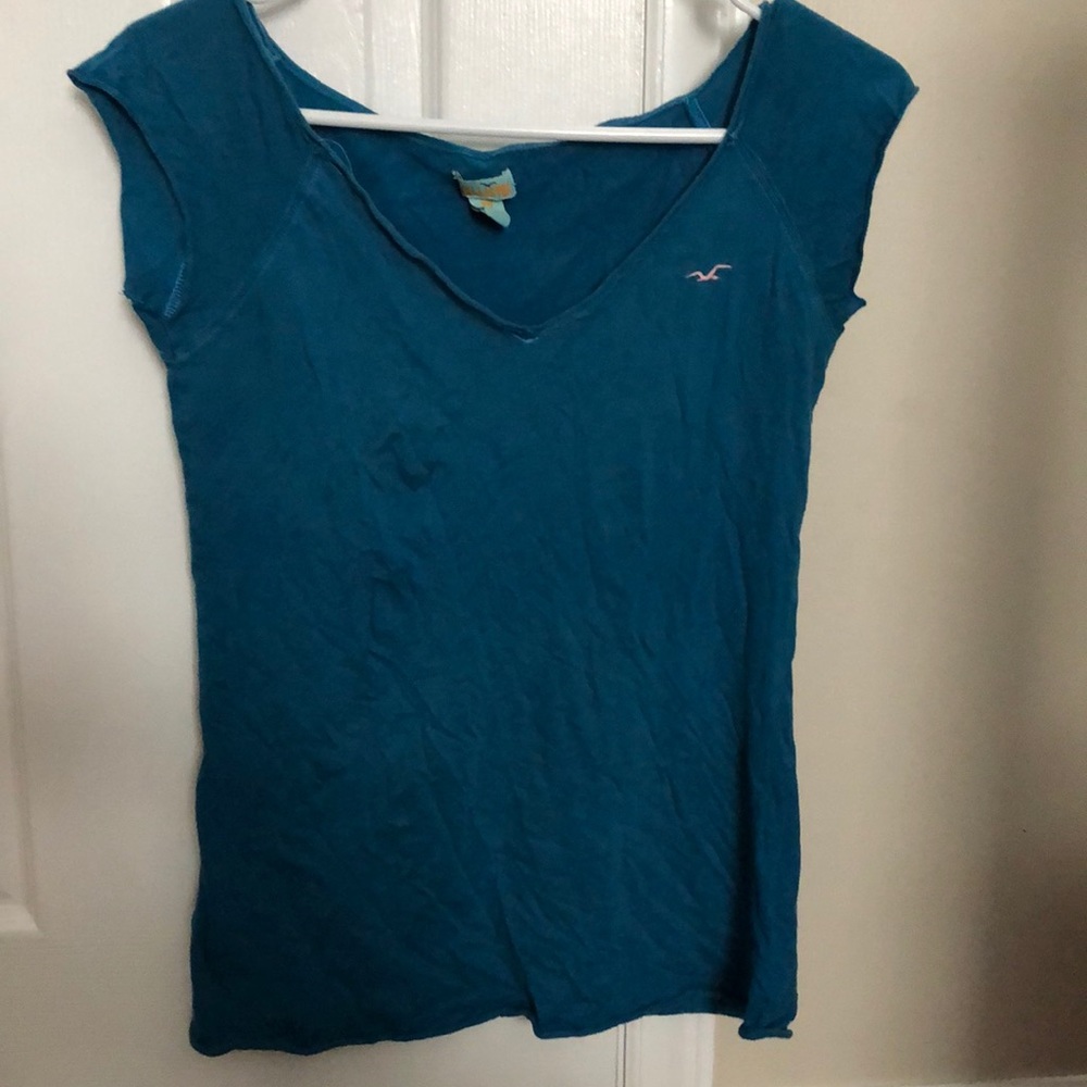 A blue hollister tee